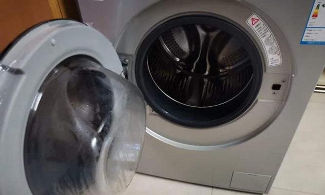 轻松掌握洗衣机清洁技巧（让您的洗衣机焕然一新）