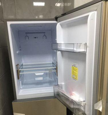 冰柜进不了门的原因及解决方法（为什么冰柜无法通过门口）